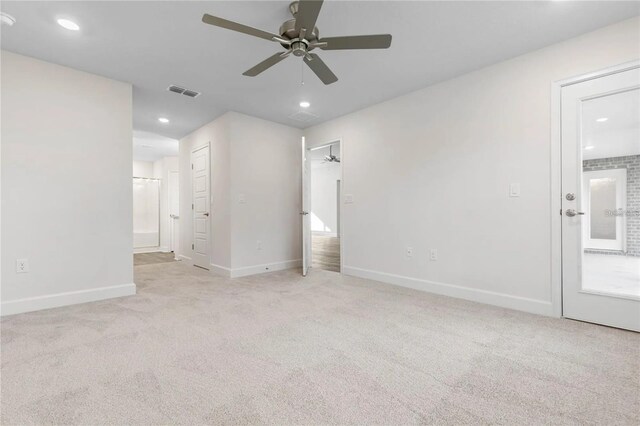 21 Uniondale Pl, Palm Coast, FL 32164 - unfurnished bedroom featuring recessed lighting, connected bathroom, visible vents, baseboards, and carpet floors