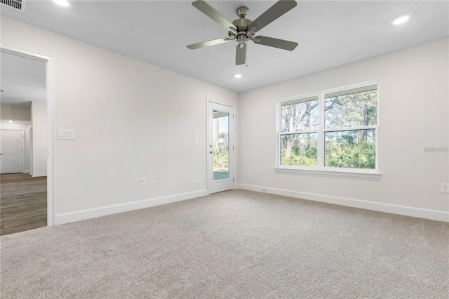 21 Uniondale Pl, Palm Coast, FL 32164 - empty room with recessed lighting, carpet, and baseboards