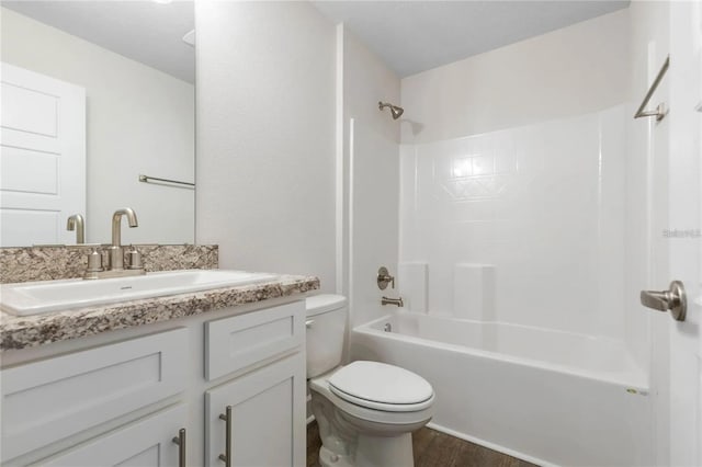 21 Uniondale Pl, Palm Coast, FL 32164 - full bath with wood finished floors, toilet, shower / bathtub combination, and vanity