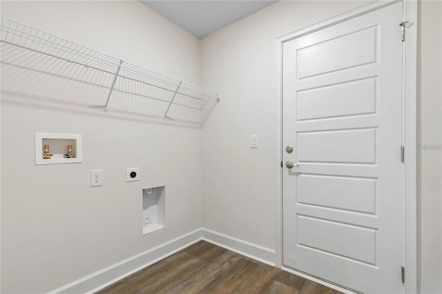21 Uniondale Pl, Palm Coast, FL 32164 - laundry area with electric dryer hookup, baseboards, hookup for a washing machine, dark wood-style flooring, and laundry area