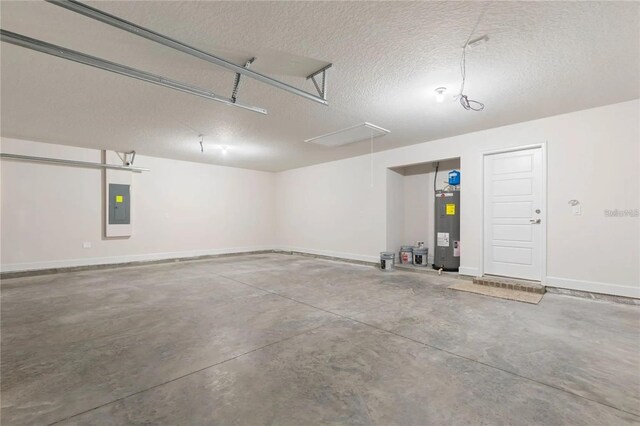 21 Uniondale Pl, Palm Coast, FL 32164 - garage with electric panel, baseboards, and electric water heater