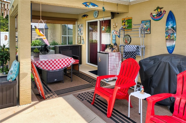 16 Rockne Ln, Palm Coast, FL 32164 - view of patio featuring a grill
