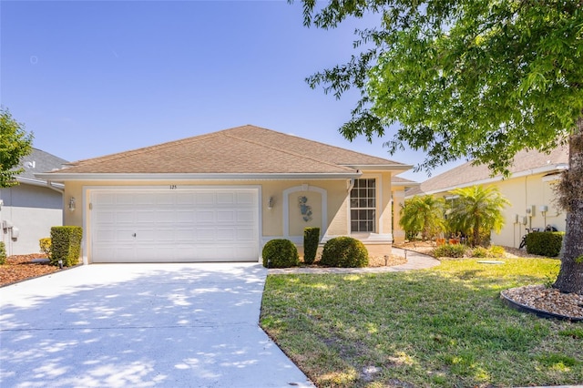 125 Raintree Cir, Palm Coast, FL 32164 - ranch-style home featuring concrete driveway, a front lawn, stucco siding, and a garage