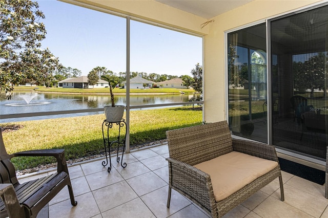 125 Raintree Cir, Palm Coast, FL 32164 - sunroom / solarium featuring a water view