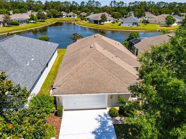 125 Raintree Cir, Palm Coast, FL 32164 - bird's eye view featuring a water view and a residential view