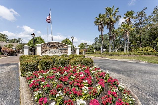 125 Raintree Cir, Palm Coast, FL 32164 - community sign with fence and a gate