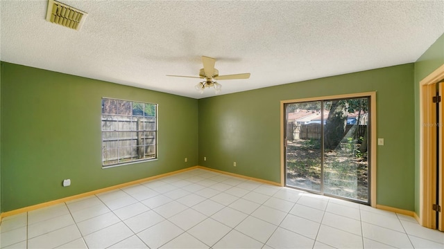 689 16th St, Saint Augustine, FL 32080 - empty room featuring ceiling fan, a textured ceiling, and baseboards