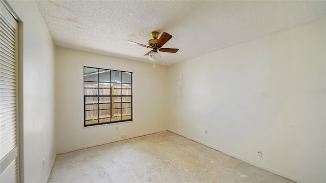 689 16th St, Saint Augustine, FL 32080 - empty room with ceiling fan, baseboards, concrete flooring, and a textured ceiling