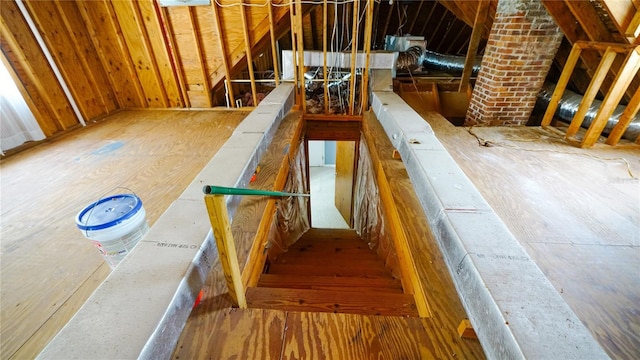 689 16th St, Saint Augustine, FL 32080 - unfinished attic featuring an upstairs landing