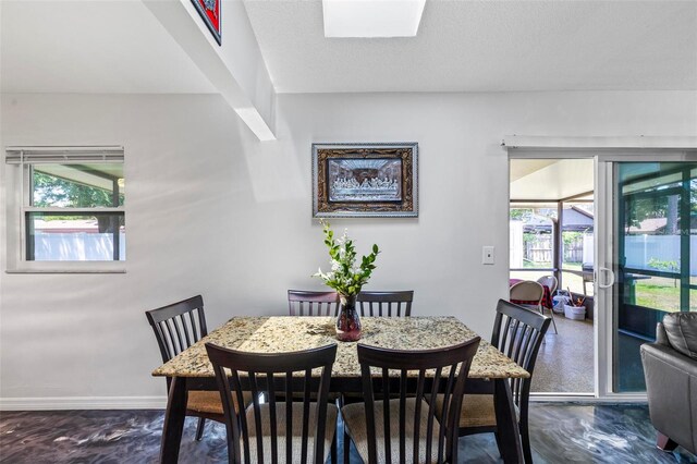 13 Belleaire Dr, Palm Coast, FL 32137 - dining space with baseboards