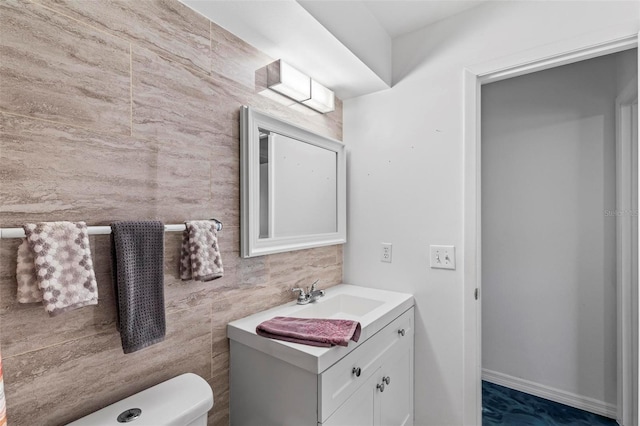13 Belleaire Dr, Palm Coast, FL 32137 - bathroom with vanity and toilet