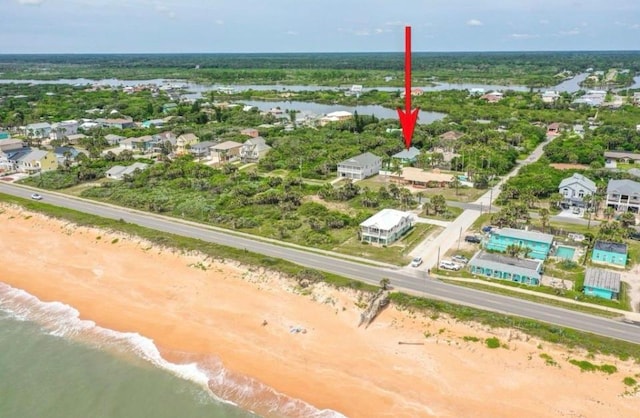 aerial view with a beach view and a water view