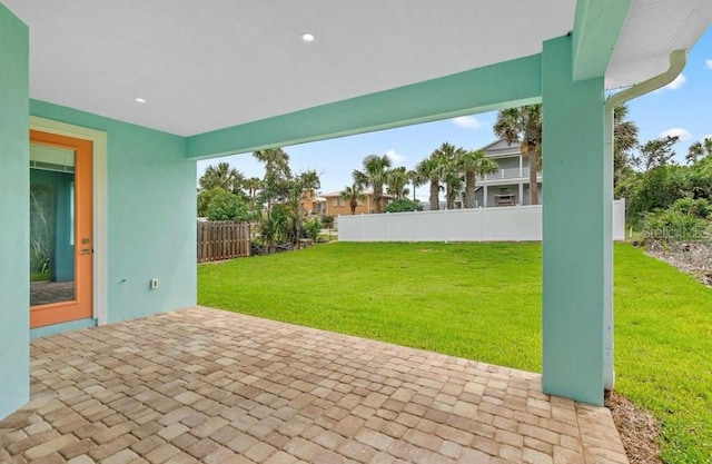 view of patio / terrace featuring fence