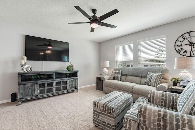 7 Windsor Ter, Palm Coast, FL 32164 - carpeted living area with a ceiling fan, baseboards, and a textured ceiling