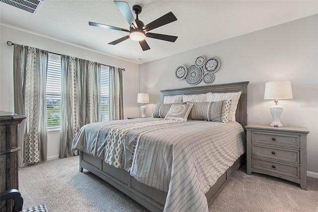 7 Windsor Ter, Palm Coast, FL 32164 - bedroom featuring visible vents, baseboards, ceiling fan, and light colored carpet