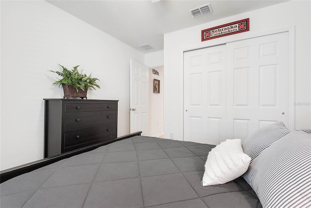 7 Windsor Ter, Palm Coast, FL 32164 - bedroom featuring a closet and visible vents