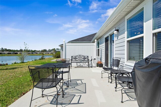 7 Windsor Ter, Palm Coast, FL 32164 - view of patio with a water view and area for grilling
