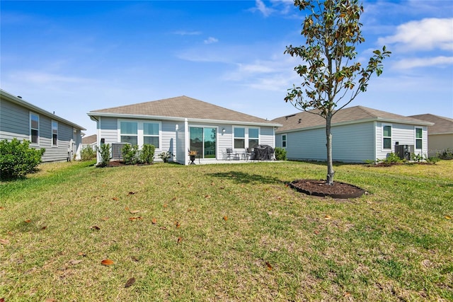 7 Windsor Ter, Palm Coast, FL 32164 - back of property with a yard and central AC