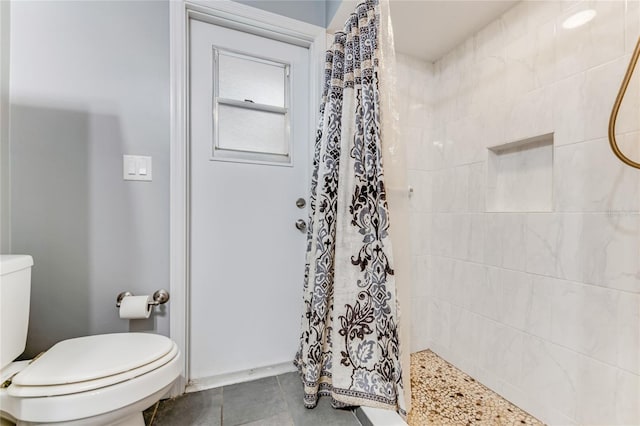 11 Larisa Ter, Ormond Beach, FL 32174 - bathroom with a tile shower and toilet