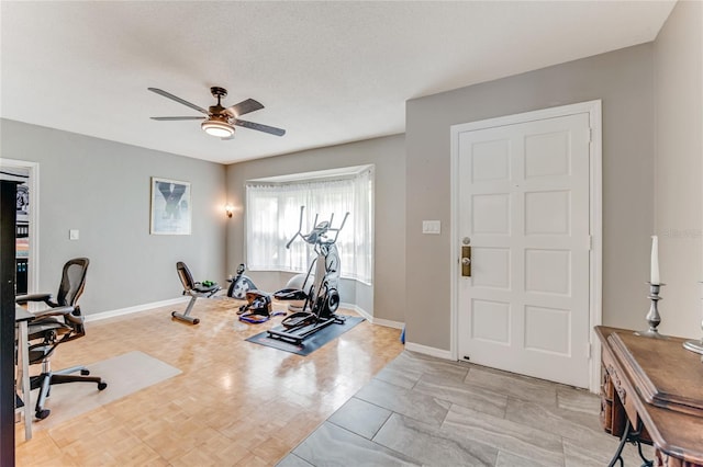 11 Larisa Ter, Ormond Beach, FL 32174 - workout room featuring a ceiling fan and baseboards