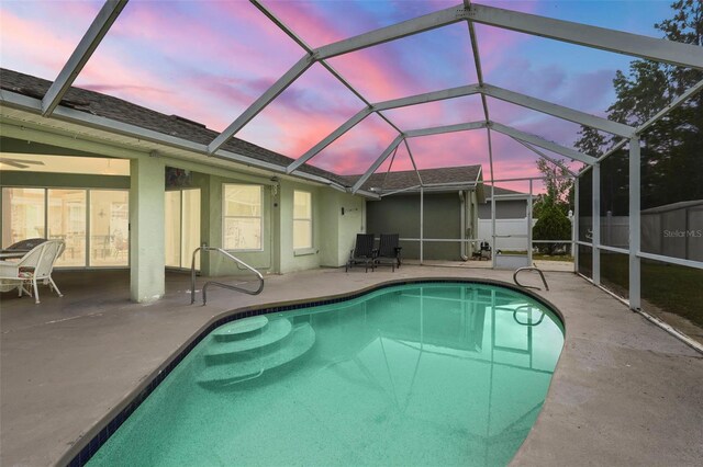 3 Bickford Dr, Palm Coast, FL 32137 - view of swimming pool with a fenced in pool, glass enclosure, and a patio area