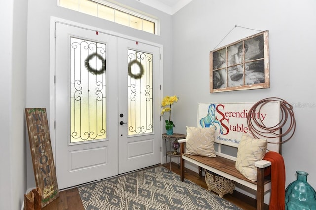 entryway with french doors and dark wood finished floors