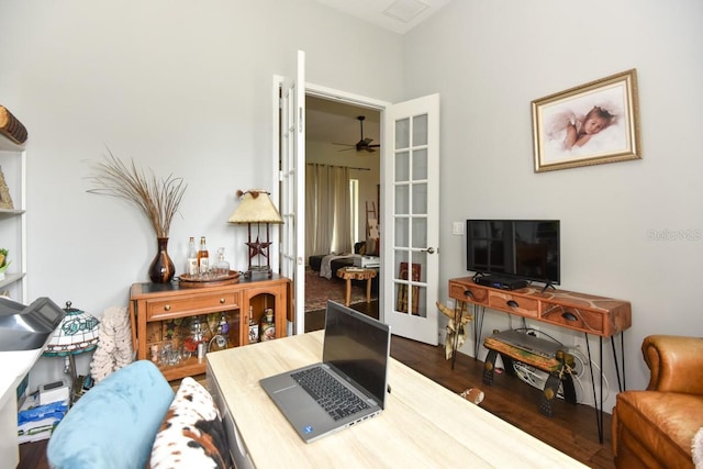 living room with ceiling fan, visible vents, french doors, and wood finished floors