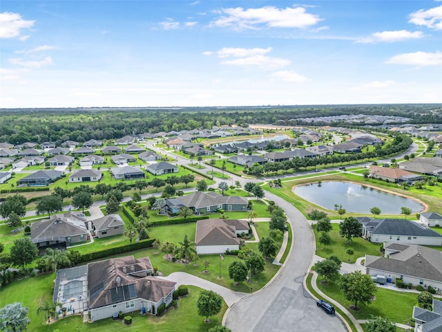 bird's eye view featuring a residential view and a water view
