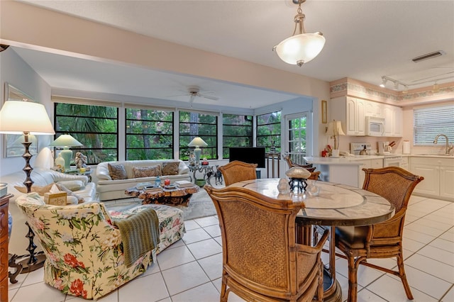15 Morning Dew Trl, Ormond Beach, FL 32174 - dining room featuring track lighting, light tile patterned floors, and ceiling fan