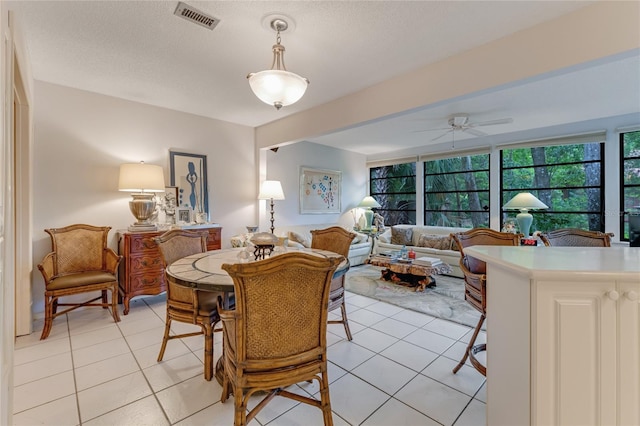 15 Morning Dew Trl, Ormond Beach, FL 32174 - dining room featuring a ceiling fan and light tile patterned floors
