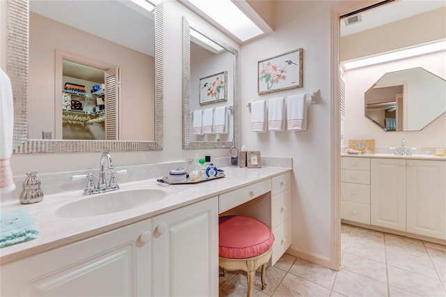 15 Morning Dew Trl, Ormond Beach, FL 32174 - bathroom with tile patterned flooring, vanity, and baseboards