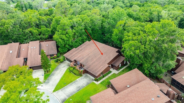 15 Morning Dew Trl, Ormond Beach, FL 32174 - aerial view of property and surrounding area featuring a heavily wooded area