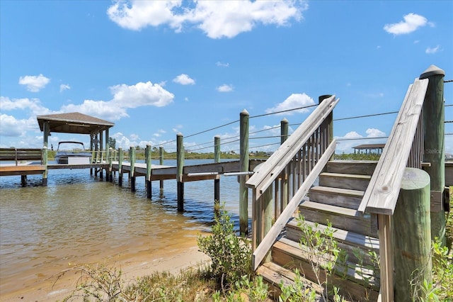 view of dock with a water view