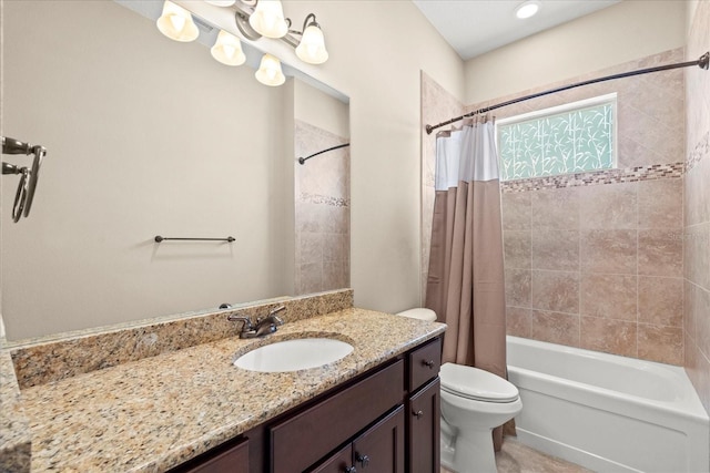 full bathroom with toilet, shower / bath combo, and vanity