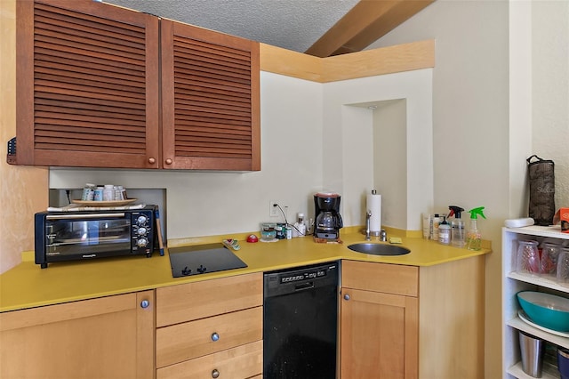 101 Palm Harbor Pkwy Unit A303, Palm Coast, FL 32137 - kitchen with black appliances, light brown cabinets, light countertops, and a sink