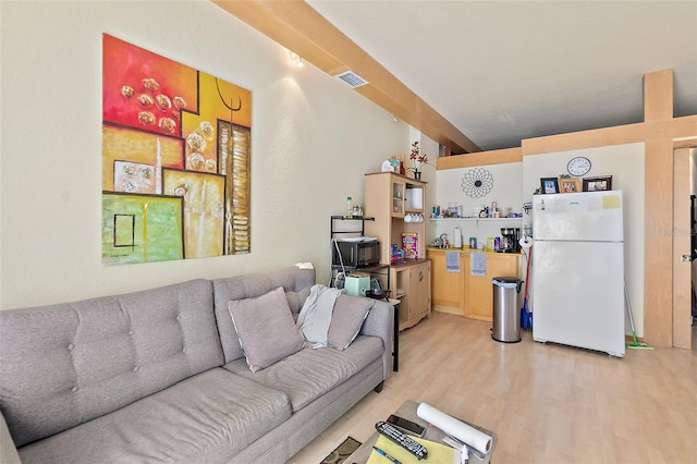 101 Palm Harbor Pkwy Unit A303, Palm Coast, FL 32137 - living room featuring light wood-style floors
