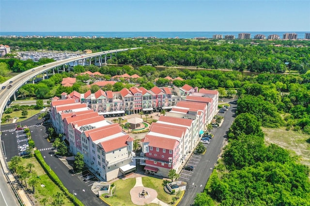 101 Palm Harbor Pkwy Unit A303, Palm Coast, FL 32137 - view of urban area featuring a tree filled landscape and a large body of water