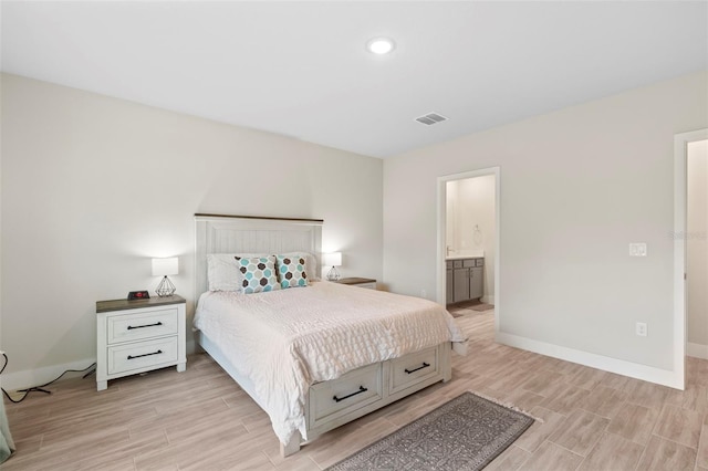 bedroom with recessed lighting, wood finish floors, visible vents, and baseboards