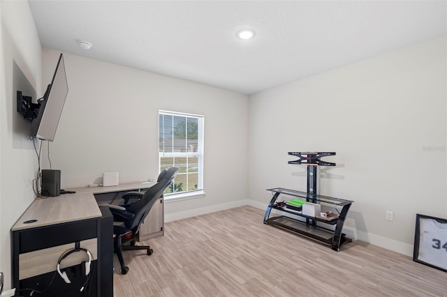 home office with baseboards, recessed lighting, and light wood-style floors