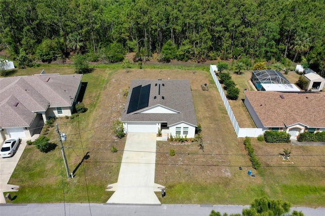 bird's eye view featuring a forest view