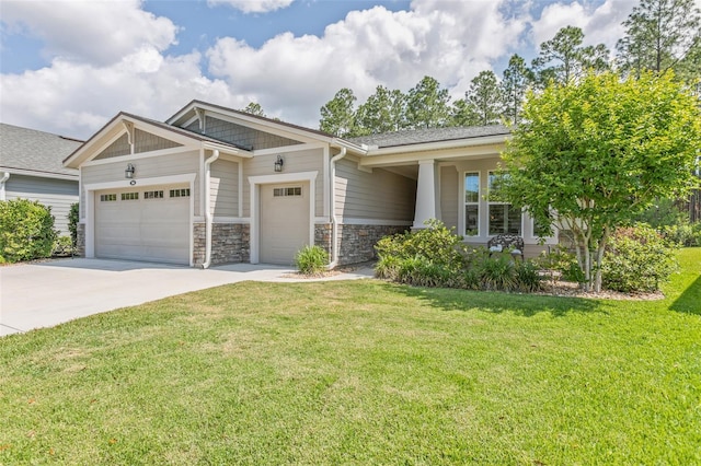 106 Key Grass Ct, Saint Johns, FL 32259 - craftsman house featuring an attached garage, driveway, stone siding, and a front lawn