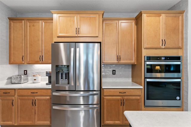 106 Key Grass Ct, Saint Johns, FL 32259 - kitchen with light countertops, stainless steel appliances, and decorative backsplash