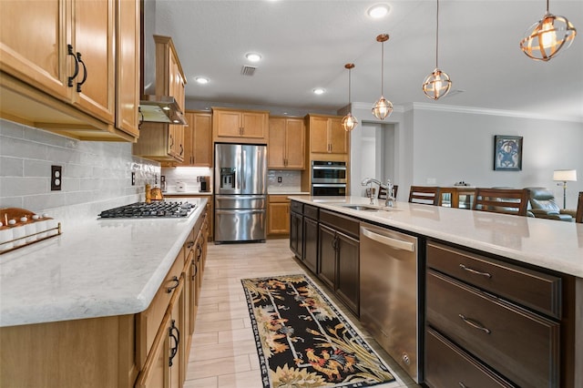 106 Key Grass Ct, Saint Johns, FL 32259 - kitchen with crown molding, pendant lighting, tasteful backsplash, a sink, and appliances with stainless steel finishes