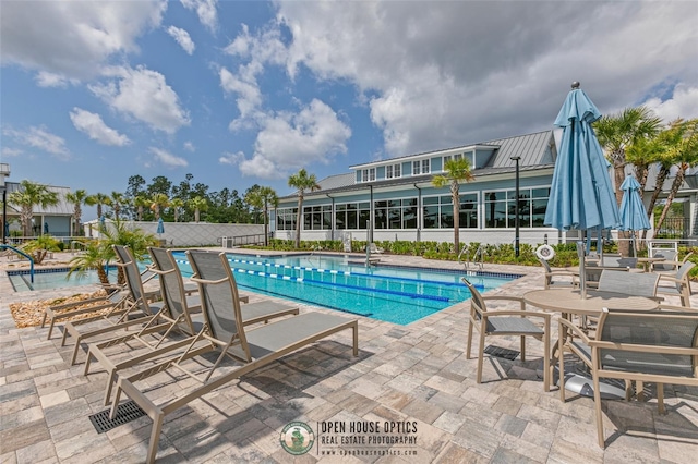 106 Key Grass Ct, Saint Johns, FL 32259 - community pool featuring a patio and fence