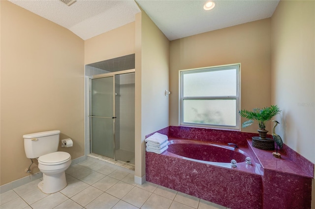 full bath with a bath, tile patterned floors, toilet, and a shower stall
