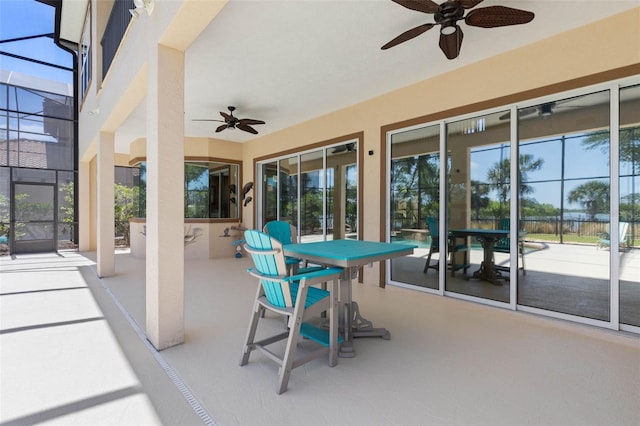 114 Emerald Lake Dr, Palm Coast, FL 32137 - view of patio / terrace featuring ceiling fan and glass enclosure