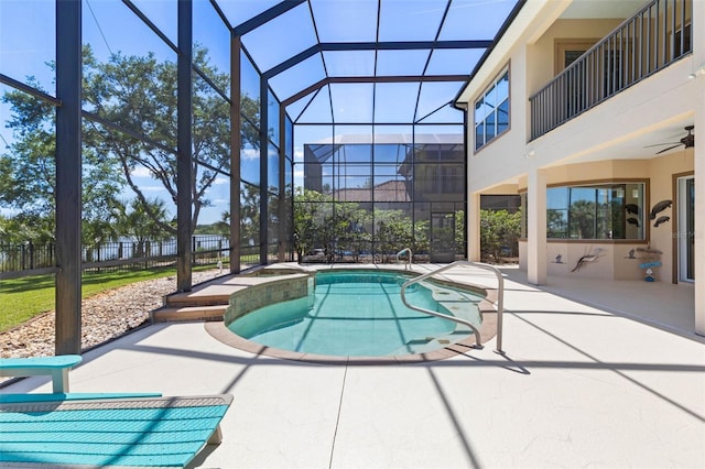 114 Emerald Lake Dr, Palm Coast, FL 32137 - pool featuring fence, a hot tub, a ceiling fan, a patio, and glass enclosure