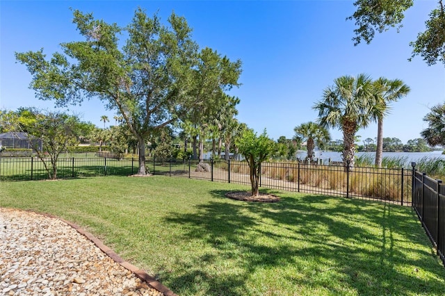 114 Emerald Lake Dr, Palm Coast, FL 32137 - view of yard featuring a fenced backyard and a water view