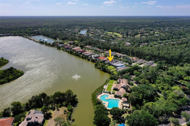 114 Emerald Lake Dr, Palm Coast, FL 32137 - aerial view featuring a water view and a wooded view