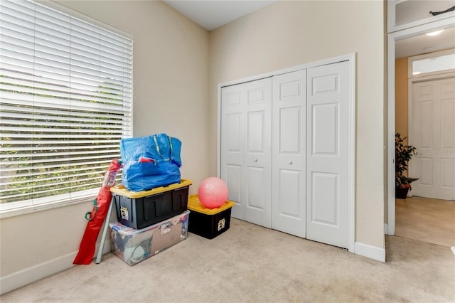 69 Coquina Ridge Way, Ormond Beach, FL 32174 - rec room with baseboards and carpet flooring